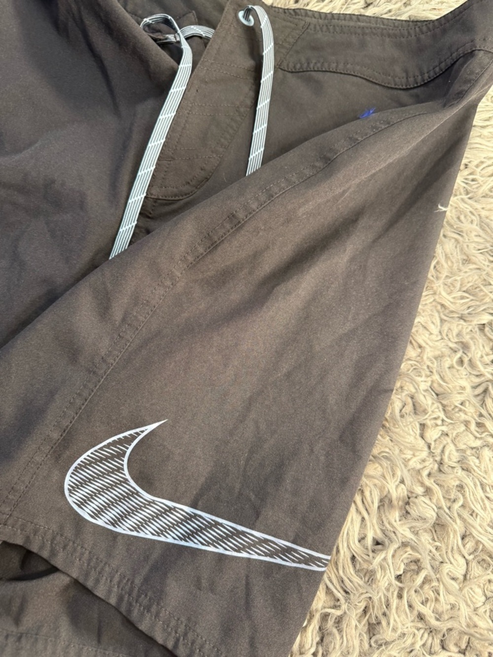 Nike Gray Swim Trunks with White Swoosh